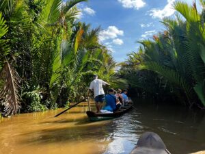 Boat trip through lush green mangroves